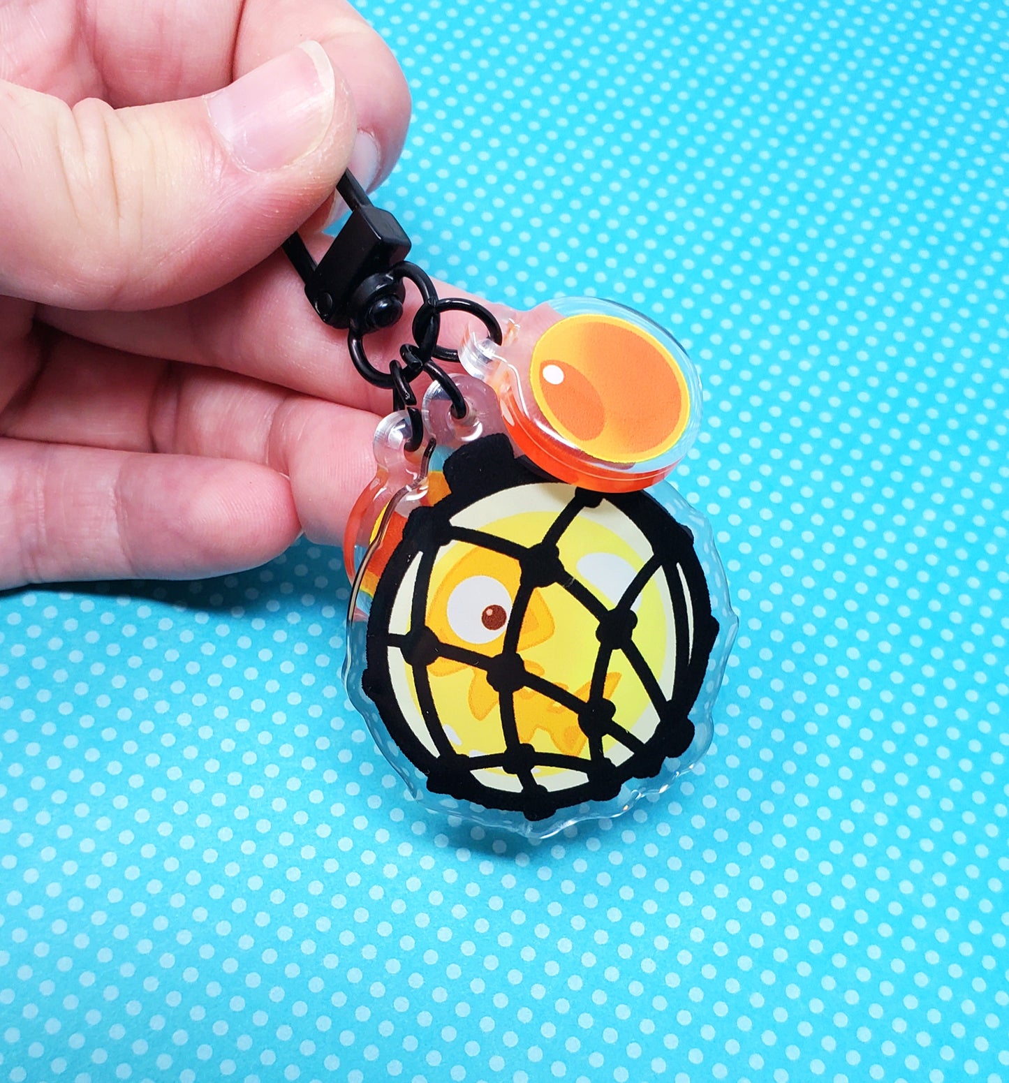 Golden Egg and Power Eggs 2" Acrylic Keychain Set